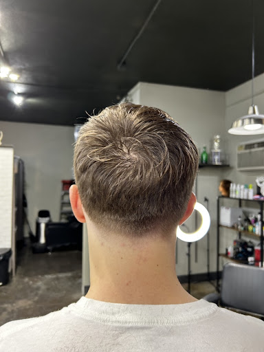 Low taper back view haircut