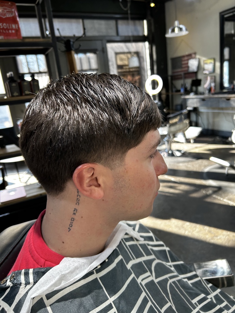 Clean taper fade side profile at LifeStyle Barber