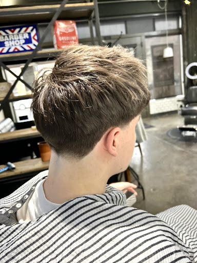 Textured top haircut with a clean taper fade in Walla Walla WA